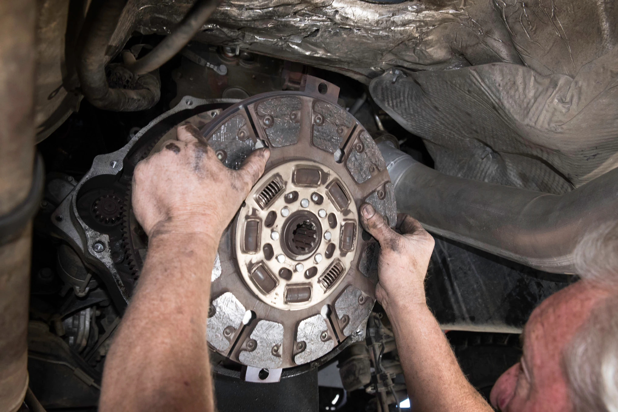 Picture of technician installing clutch disk